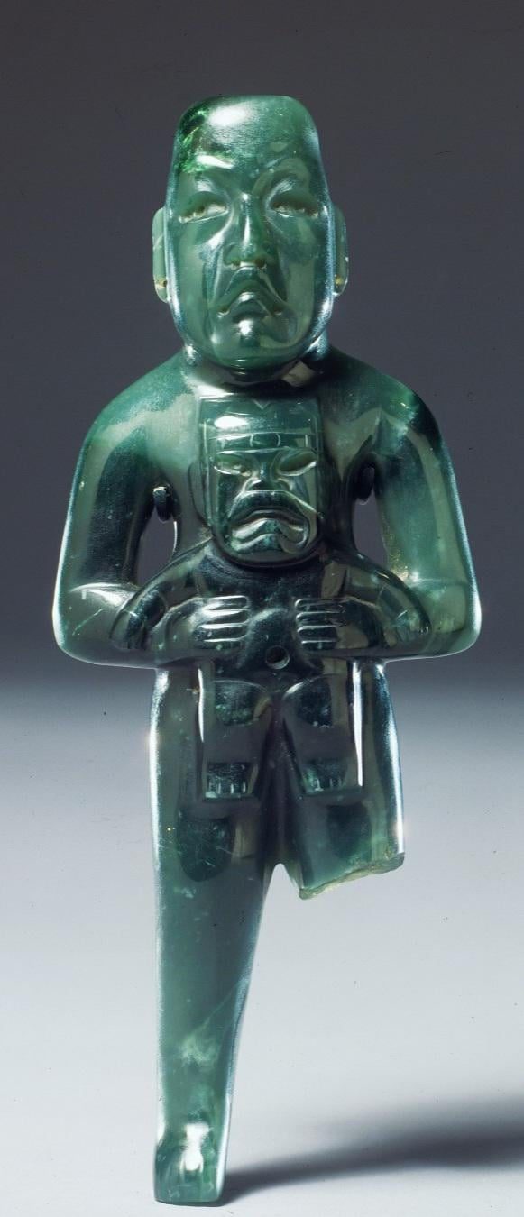 An Olmec jade statuette of a standing figure holding a were-jaguar baby.  From Mexico, 900-300 BCE, now housed at the Kimbell Art Museum in Texas  [581x1350] : r/ArtefactPorn